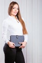 Young woman office worker hold case with files. Royalty Free Stock Photo