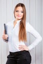 Young woman office worker hold case with files. Royalty Free Stock Photo