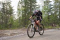 Young woman offroad cycling