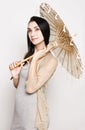 Young woman with an old Chinese umbrella Royalty Free Stock Photo