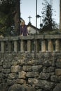 A young woman in an old Portuguese park. Porto. Royalty Free Stock Photo