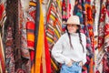 Old traditional Turkish carpet shop in cave house Cappadocia, Turkey Kapadokya. Young woman on vacation in Turkey Royalty Free Stock Photo