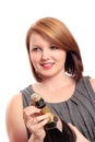 Young woman opening a bottle of champagne Royalty Free Stock Photo