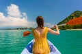 Young woman paddling a canoe during vacation in Flores Island, Indonesia Royalty Free Stock Photo