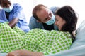 Young woman in pain pushing for childbirth at maternity Royalty Free Stock Photo