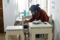 Young woman painting furniture at home Royalty Free Stock Photo