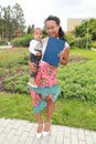 Absolvent of university with baby and diploma