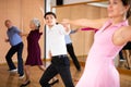 young woman with partner dance jive