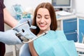 Young woman patient visiting dentist in the dental Royalty Free Stock Photo