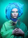 Young woman with peacock feathers Royalty Free Stock Photo