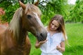 Young woman and peasant bay horse