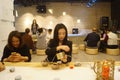 Young woman performing the tea ceremony
