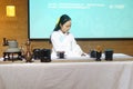 Young woman performing the tea ceremony