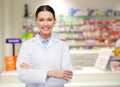 Young woman pharmacist drugstore or pharmacy Royalty Free Stock Photo