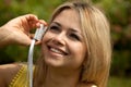 Young woman on phone representative smiling