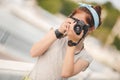 Young woman photographer portrait. Soft colors. Royalty Free Stock Photo