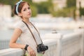 Young woman photographer portrait. Soft colors. Royalty Free Stock Photo