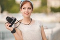 Young woman photographer portrait. Soft colors. Royalty Free Stock Photo