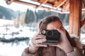 Woman photographing with retro instant film camera Royalty Free Stock Photo