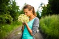 Young woman picking elderflower Royalty Free Stock Photo