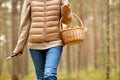 young woman picking mushrooms in autumn forest Royalty Free Stock Photo