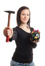 Young woman piggy bank hammer