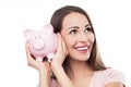 Young woman with piggy bank Royalty Free Stock Photo