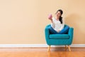 Young woman with a piggy bank Royalty Free Stock Photo