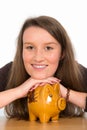 Young woman with piggybank