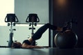 Young woman pilates training in the gym