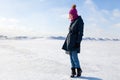 Woman walking on the frozen sea Royalty Free Stock Photo