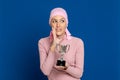 Young woman with pink scarf on the head Royalty Free Stock Photo