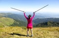 Young woman in pink trekking in the mountain Royalty Free Stock Photo