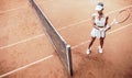 young woman play tennis on tennis court