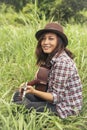 Young women playing acoustic guitar outdoor in green park. Woman person playing acoustic guitar music instrument at home, young Royalty Free Stock Photo