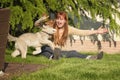 Young woman playing with the dogs. Royalty Free Stock Photo