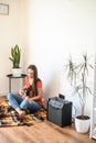 Young woman plays electric guitar at home Royalty Free Stock Photo