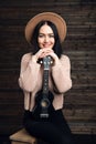 Young woman playing guitar and smiling. Music concept. Home atmosphere on background. Royalty Free Stock Photo