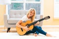 Young woman playing her guitar Royalty Free Stock Photo