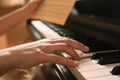 Young woman playing piano, closeup. Music lesson Royalty Free Stock Photo