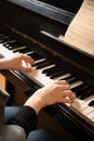 Young woman playing piano, closeup. Music lesson Royalty Free Stock Photo