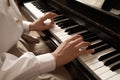 Young woman playing piano, closeup. Music lesson Royalty Free Stock Photo