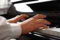 Young woman playing piano, closeup. Music lesson Royalty Free Stock Photo