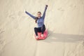 Young Woman Playing in the Sand Dunes Outdoor Lifestyle Royalty Free Stock Photo