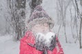 Young woman playing with snow Royalty Free Stock Photo