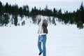 A young woman playing snow in the mountain. Outdoor activity during winter season and happy moment Royalty Free Stock Photo