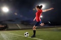 Young woman playing soccer Royalty Free Stock Photo