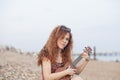 Young woman playing ukulele Royalty Free Stock Photo