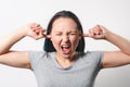 A young woman plugged her ears with her fingers Royalty Free Stock Photo