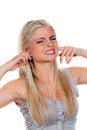 Young Woman Plugging Ears